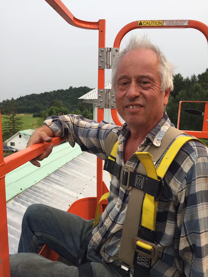 Joe working on the roof